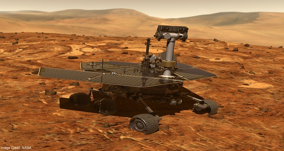The Martian Rover Opportunity rolls across the barren red, rocky landscape of Mars gathering data 14 years after its expected life time. The power provided by the solar array mounted to the top of the rover allows it to keep going, even through the harsh Martian winter.